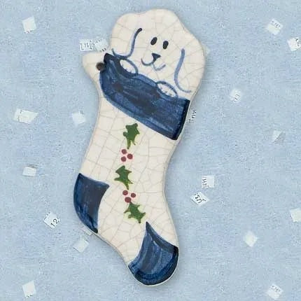 Puppy in Stocking Ceramic Ornament by Mary DeCaprio