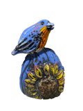 Vase with Bluebird and Sunflowers by Nancy Briggs