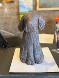 Sitting Shaggy Dog by Sharon Stelter