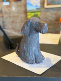 Sitting Shaggy Dog by Sharon Stelter