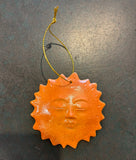 Orange Sun-Face Ornament by Roberta Polfus