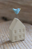 Tiny House With Bird by Tasha McKelvey