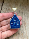 Tiny House With Bird by Tasha McKelvey