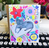 Black Cat Napping on Book Greeting Card by Honeyberry Studios