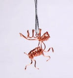 Tiny Flying Reindeer Ornament by Drawn Metal Studios