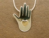 Heart in Hand Necklace by Margie Magnuson