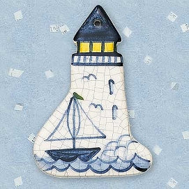 Lighthouse with Sailboat Ceramic Ornament by Mary DeCaprio