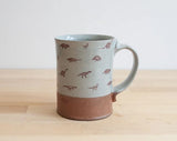 Mini Dinosaurs Mug by Keith Hershberger