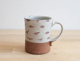 Mini Dinosaurs Mug by Keith Hershberger