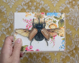 Rhinoceros Beetle Blank Greeting Card by Emily Uchytil