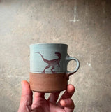 Velociraptor Americano Mug by Keith Hershberger