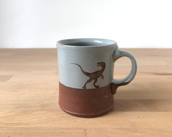 Little Velociraptor Americano Mug by Keith Hershberger